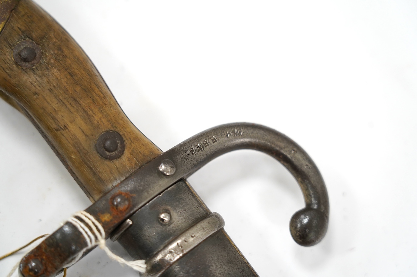 An 1880 French bayonet and scabbard for a Gras rifle. Condition - good, some pitting